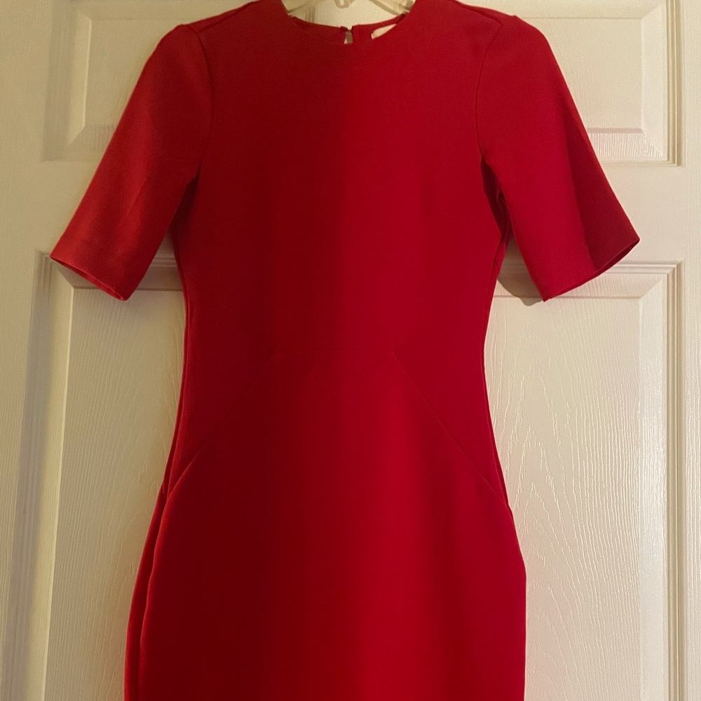 H and M red dress never worn. Brand new.